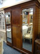 A large Edwardian two-mirror door wardrobe, 207 x 165 x 57cms