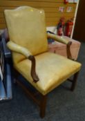 A mahogany framed leather & studded Gainsborough elbow chair