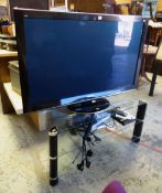 A Panasonic Viera 50-inch flatscreen television, stand & DVD player E/T