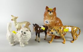 A collection of Beswick animals including cats, tiger, pony & deer