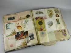 Early twentieth century album containing Christmas cards, greetings cards etc