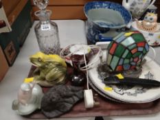 A cut glass decanter, coloured glass table lamp, ceramic frog money box etc