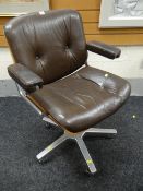 A brown button back leather & bentwood office / desk chair