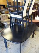 A modern Danish black ash extending dining table & four high back chairs, 72 x 148 x 90cms