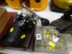 A cased model car, Brinz binoculars, AA car badge etc