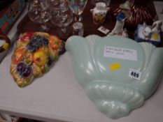 Dartmouth pottery wall plaque together with a Sylvac wall pocket