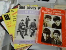 A parcel of Beatles ephemera including `The Concise Beatles Complete` etc