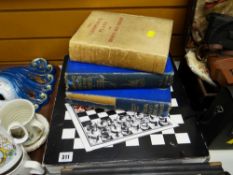 A boxed glass chess drinking game, two volumes of 'Shipping Wonders of the World' etc