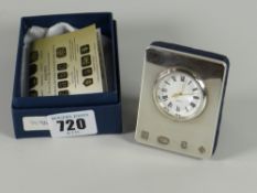 A small hallmarked silver travel clock