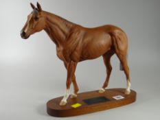 Beswick model of a racehorse 'Grundy' on wooden plinth