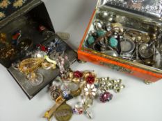 Two tins containing quantity of collector's spoons, costume jewellery