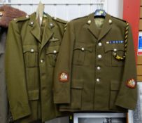Two army uniforms together with lanyards & medal ribbons (being sold on behalf of Cancer Research