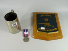 A WWII medal, EPNS tankard & military wall plaque