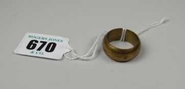 A believed 18ct gold wedding band