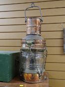 A polished copper & bronze mast head light