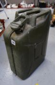 A vintage green military petrol can