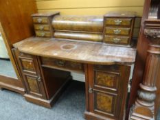 An adapted walnut kneehole desk, walnut drawer top & walnut fronted cupboard door fronts, 88 x 123 x