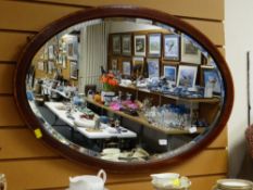 A vintage mahogany & banded bevel wall mirror