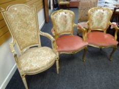 A pair of reproduction French-style gilt armchairs together with another French-style high back
