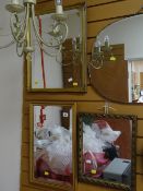 Three gilt framed wall mirrors