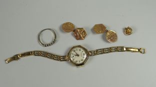 Pair of 9ct gold cuff links, gold cased watch & a silver ring
