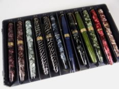 TRAY OF TWELVE CONWAY STEWART DURO MARBLED FOUNTAIN PENS including three of 'Cracked Ice' design
