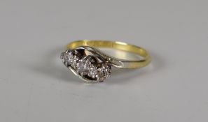 18ct GOLD & PLATINUM THREE-STONE DIAMOND TWIST SHANK RING the three stones approximately .2ct in