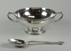 A CASED SILVER PORRINGER & SPOON SET body of porringer engraved, Birmingham 1929 by Barker Bros Ltd,