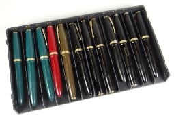 TWELVE VARIOUS VINTAGE PARKER DUOFOLD FOUNTAIN PENS including 7 x black, 3 x green & 1 x red