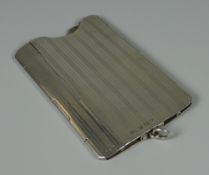 A SILVER CALLING CARD CASE WITH POP-UP MOVEMENT and machine turn decoration, Birmingham 1945, 2.