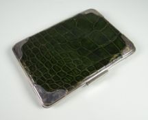 AN EXCELLENT GREEN CROCODILE LEATHER & SILVER MOUNTED WALLET with tan leather pocketed interior