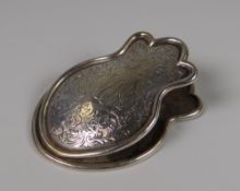 A STERLING SILVER LETTER CLIP of shield-form with foliate engraving and monogram, 1.8ozs gross