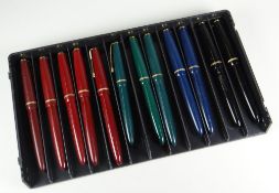 TWELVE PARKER SLIMFOLD FOUNTAIN PENS including 5 x red, 3 x green, 2 x black & 2 x blue
