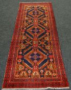 BLUE GROUND PERSIAN NOMADIC RUNNER, 110 X 275CMS