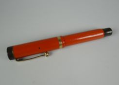VINTAGE RED JUNIOR PARKER DUOFOLD LUCKY CURVE FOUNTAIN PEN with yellow metal trim