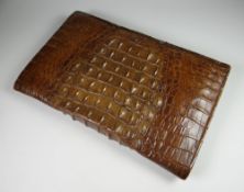 A BROWN CROCODILE SKIN VINTAGE HANDBAG