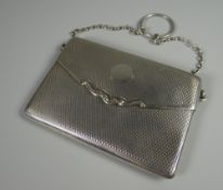 A FINE SILVER PURSE machine decorated with sprung mechanism and silver-gilt interior, Birmingham