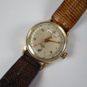 A VINTAGE HEUER GENT'S WRISTWATCH 1940s with triple date calendar, on tan leather crocodile strap (
