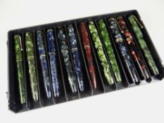 TRAY OF TWELVE VINTAGE CONWAY STEWART MARBLED FOUNTAIN PENS