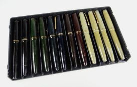 TWELVE VINTAGE PARKER VICTORY FOUNTAIN PENS (2 x brown, 2 x green, 2 x blue, 2 x black, 4 x grey)