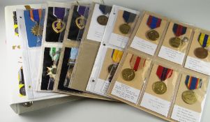 AN ALBUM OF UNITED STATES MILITARY & OTHER MEDALS to include medal group awarded to PFCEA