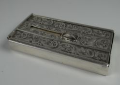 A SILVER CALLING CARD CASE WITH PATENT SLIDE MOVEMENT decorated to both sides with foliate engraving