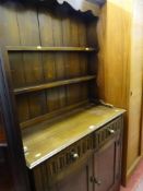 Compact Priory style dresser with two drawers over two cupboards