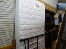 Pair of black metal framed single beds with First Support mattresses by Relyon