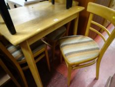 Light wood kitchen table and four chairs