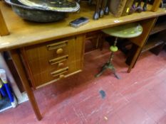 Mid Century desk with three compact drawers, possibly G-Plan