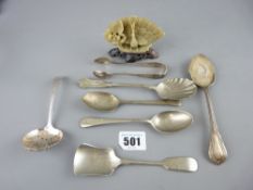 Pair of hallmarked silver sugar tongs with other table cutlery and a carved soapstone ornamental