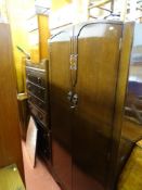 Parcel of mid Century bedroom furniture comprising dark wood wardrobe, chest of drawers, dressing