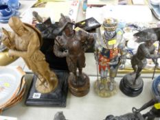 Four metallic military based figures