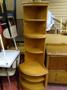 Teak effect corner unit and an oval extending dining table